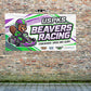 Custom 3x6 vinyl banner for a go-kart racing team, 72 by 36 inches, shown on a brick wall by Beaver Slaps
