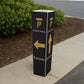 Black bollard cover with gold entrance arrows for wayfinding