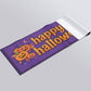 Custom 3x6 Halloween vinyl banner shown rolled, from Beaver Slaps