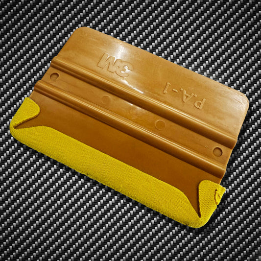 3M gold squeegee with banana buffer felt edge on carbon fiber