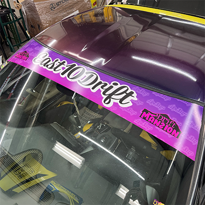 Custom car club windshield banner installed on glass, Knoxville TN